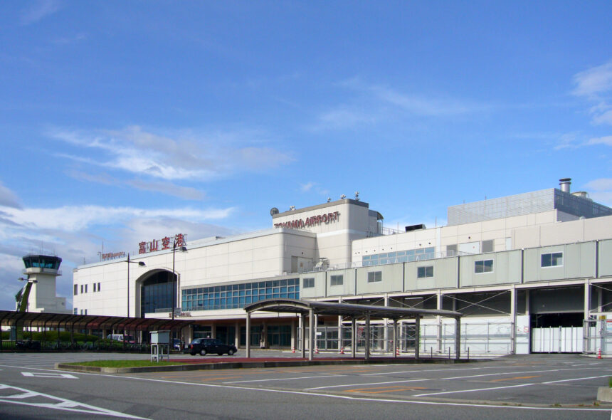 Toyama Airport terminal exterior under a blue sky