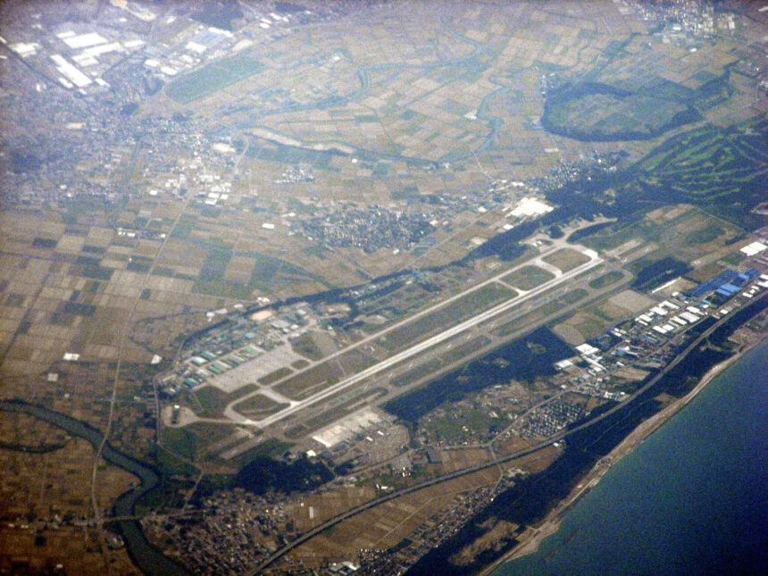 Aerial view of Komatsu Airport runway and surrounding landscape