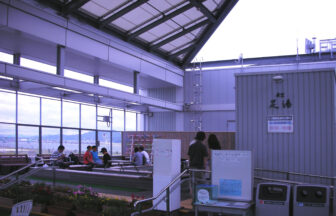 Kitakyushu Airport viewing deck and footbath area with Suo Nada in the distance