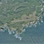 Aerial photograph of Kozushima Airport for a Chofu to Kozushima small-aircraft guide