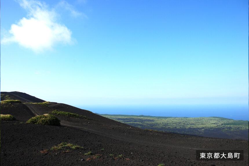 Black volcanic scoria landscape of Ura-Sabaku on Izu Oshima