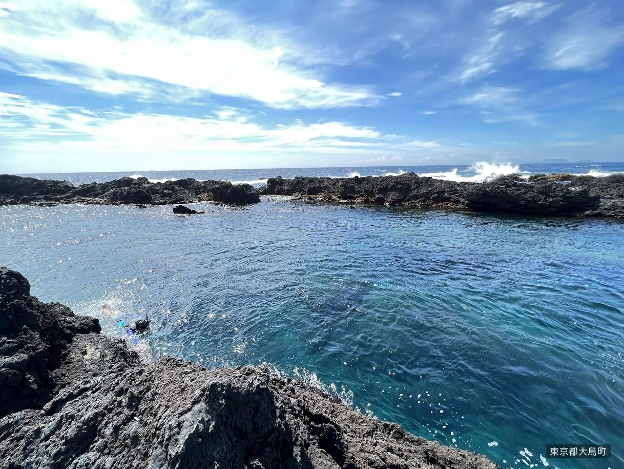 Basalt natural pool and clear water at Toshiki Coast on Izu Oshima