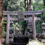 Stone torii and steps on a forest path at Okunoin in Koyasan