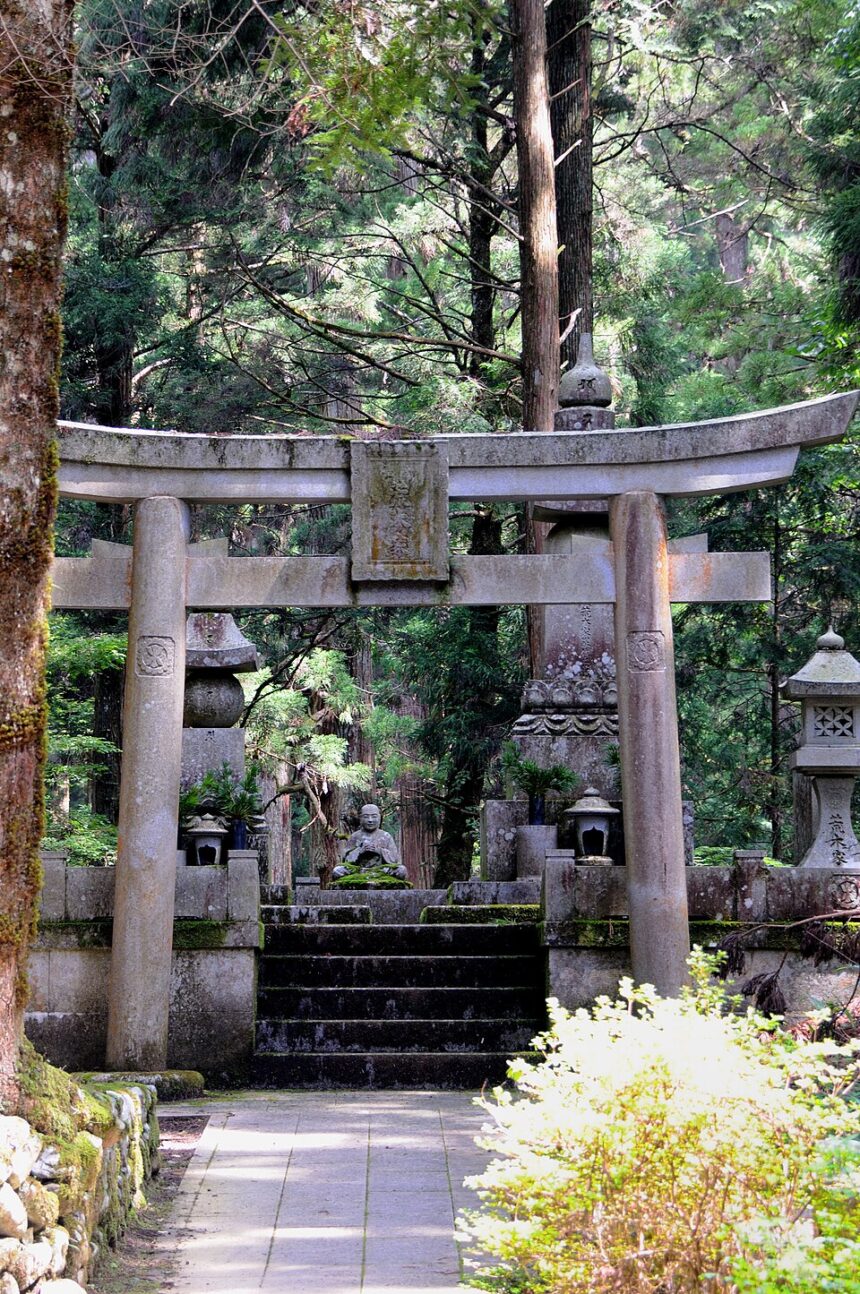 Stone torii and steps on a forest path at Okunoin in Koyasan