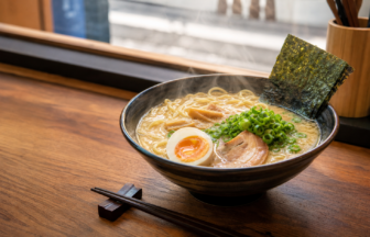 Bowl of ramen at a wooden counter in Japan