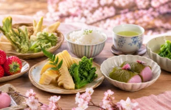 Spring foods in Japan with sakura sweets strawberries and vegetables