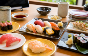 Different sushi plates at a casual sushi restaurant in Japan